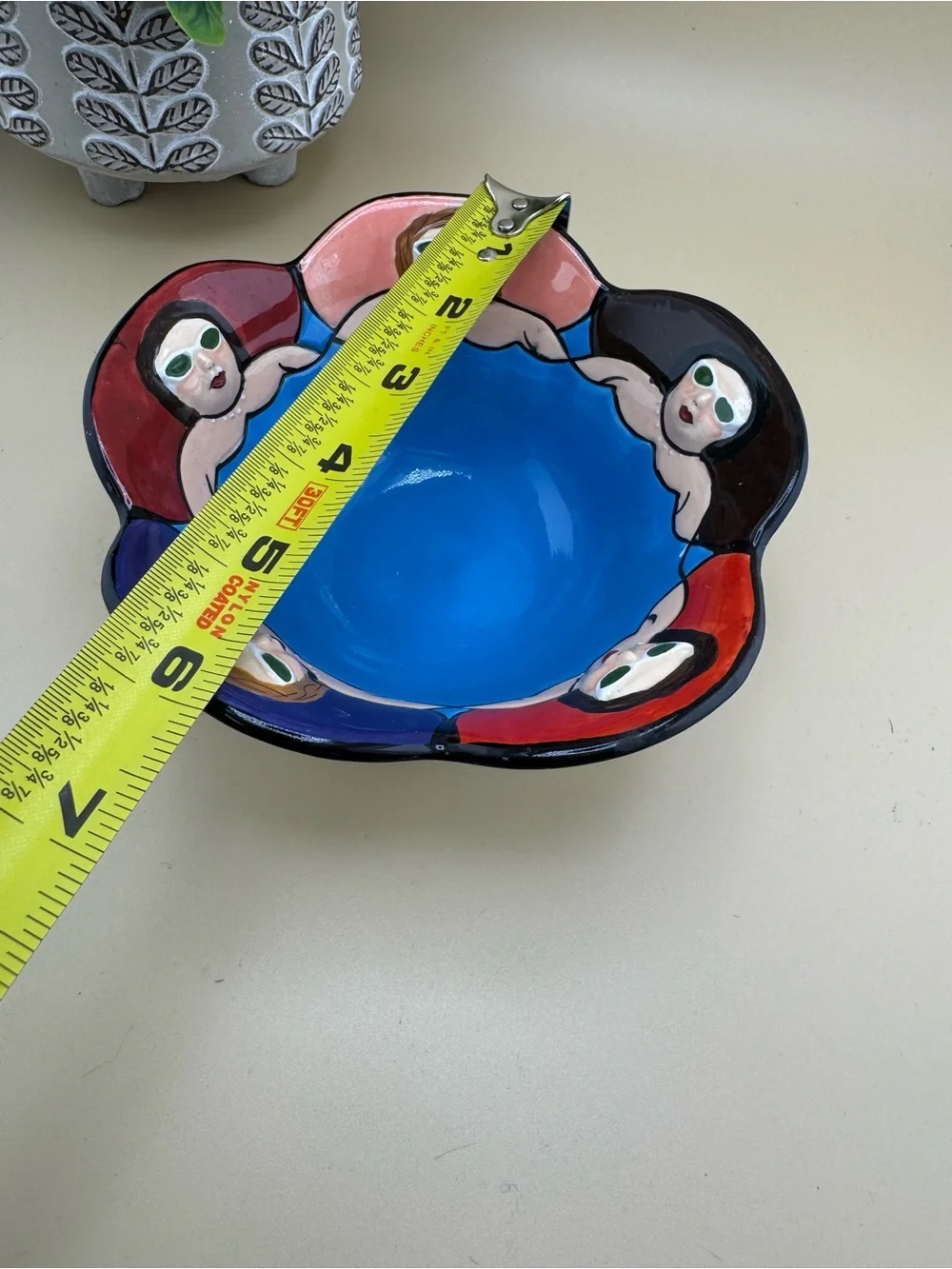 Hand-Painted Blue Ceramic Decorative Bowl with Figurative Border